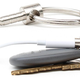 Illustration for article titled Simple Adapter Lets You Carry the iPhone 7's Headphone Dongle on Your Keychain